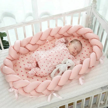bebe reducteur de lit tresse rose confort rassurant