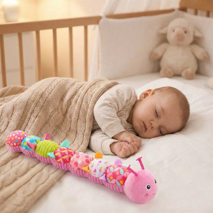 doudou bebe chenille rose dormir paisiblement