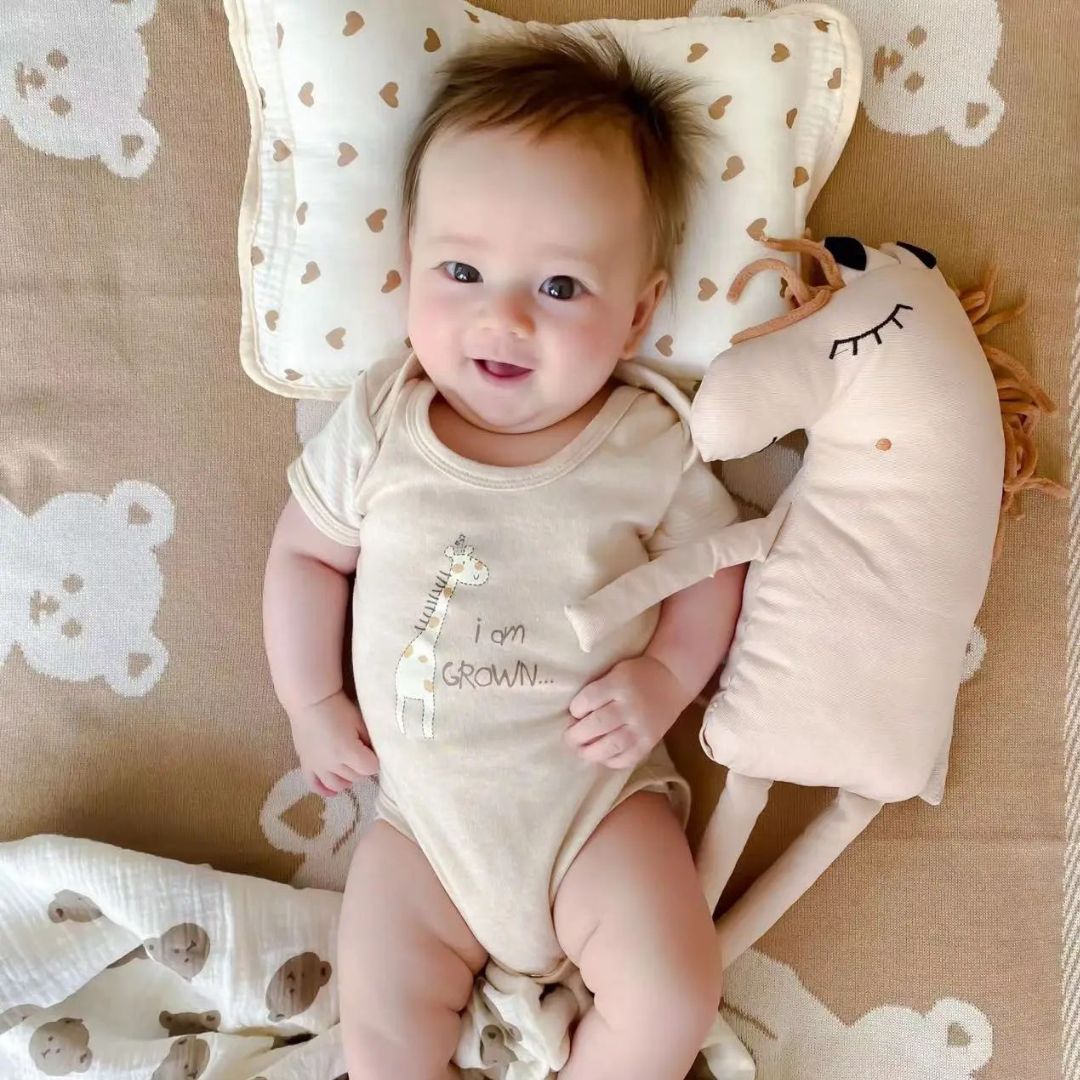doudou bebe gardien enfant heureux