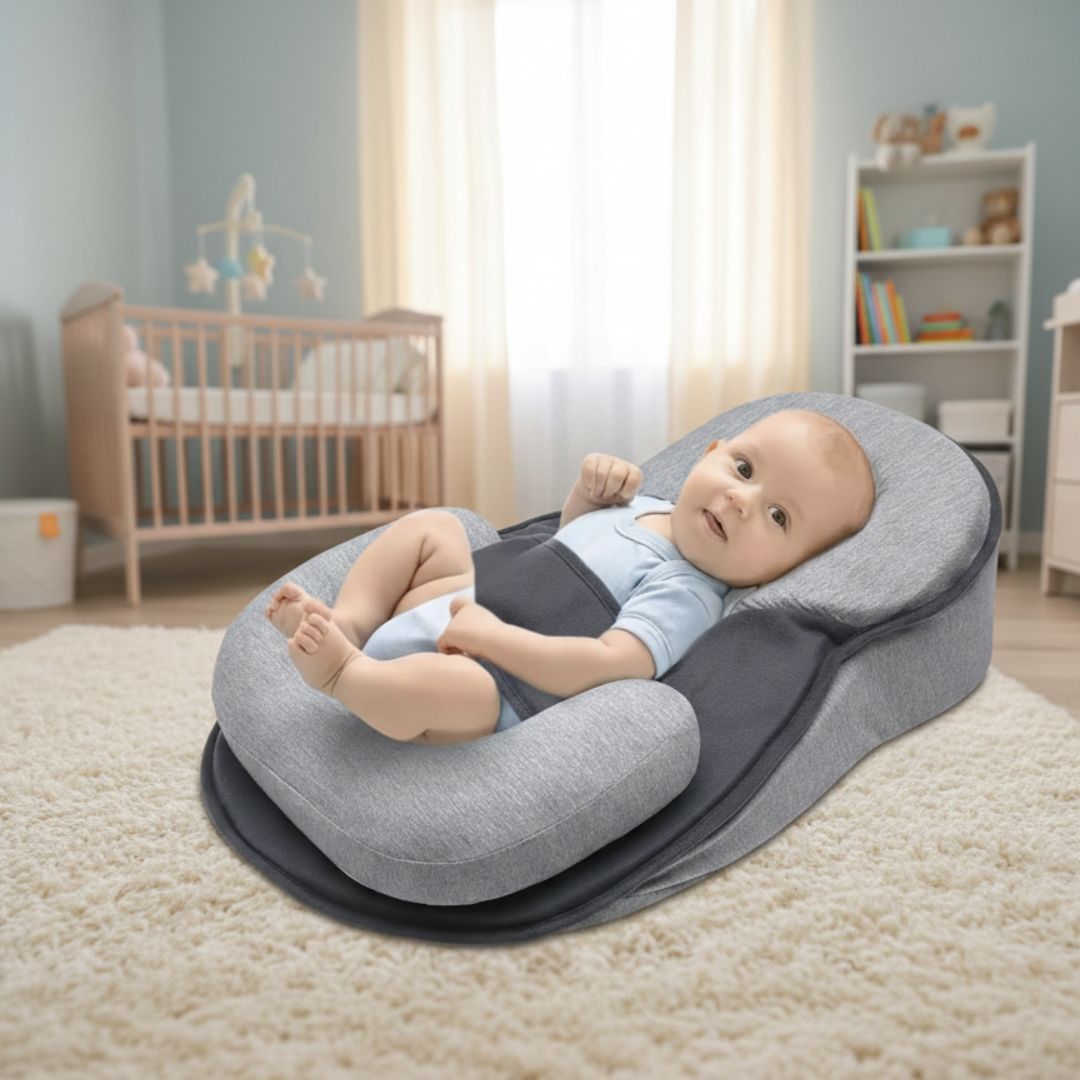 reducteur de lit bebe sensation enveloppante