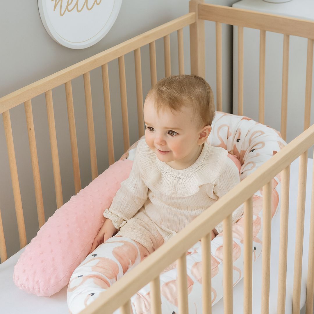 tour de lit bebe rouleau flamant rose protection rassurante